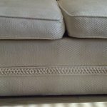 White Couch with red wine stains