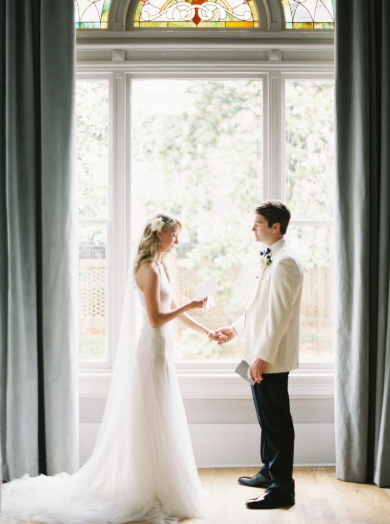 Same couple as above, exchanging rings.