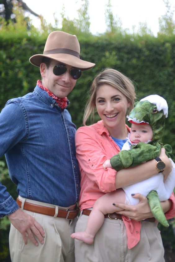 Family dressed up as the cast of Jurassic Park with the baby as a dinosaur