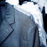 Suits on hangers for dry cleaning