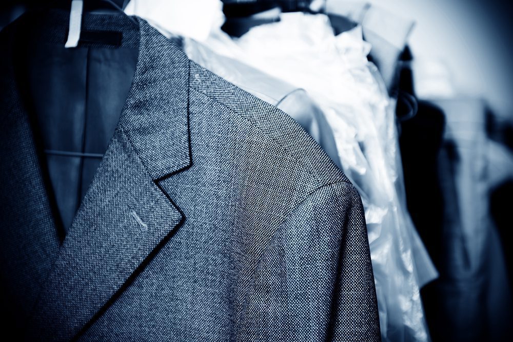 Suits on hangers for dry cleaning