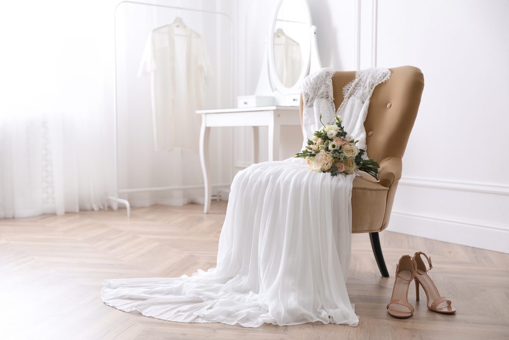 wedding,dress,preservation,shoes,chair,in,room